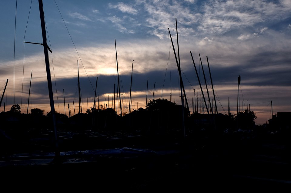Boat masts at sunrise