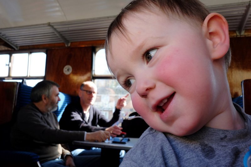Giant Baby Gazes At Grandads